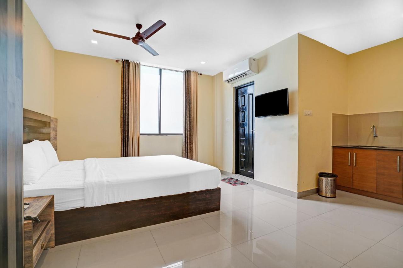 Capital O 87015 Hotel Al Salama Kochi Buitenkant foto